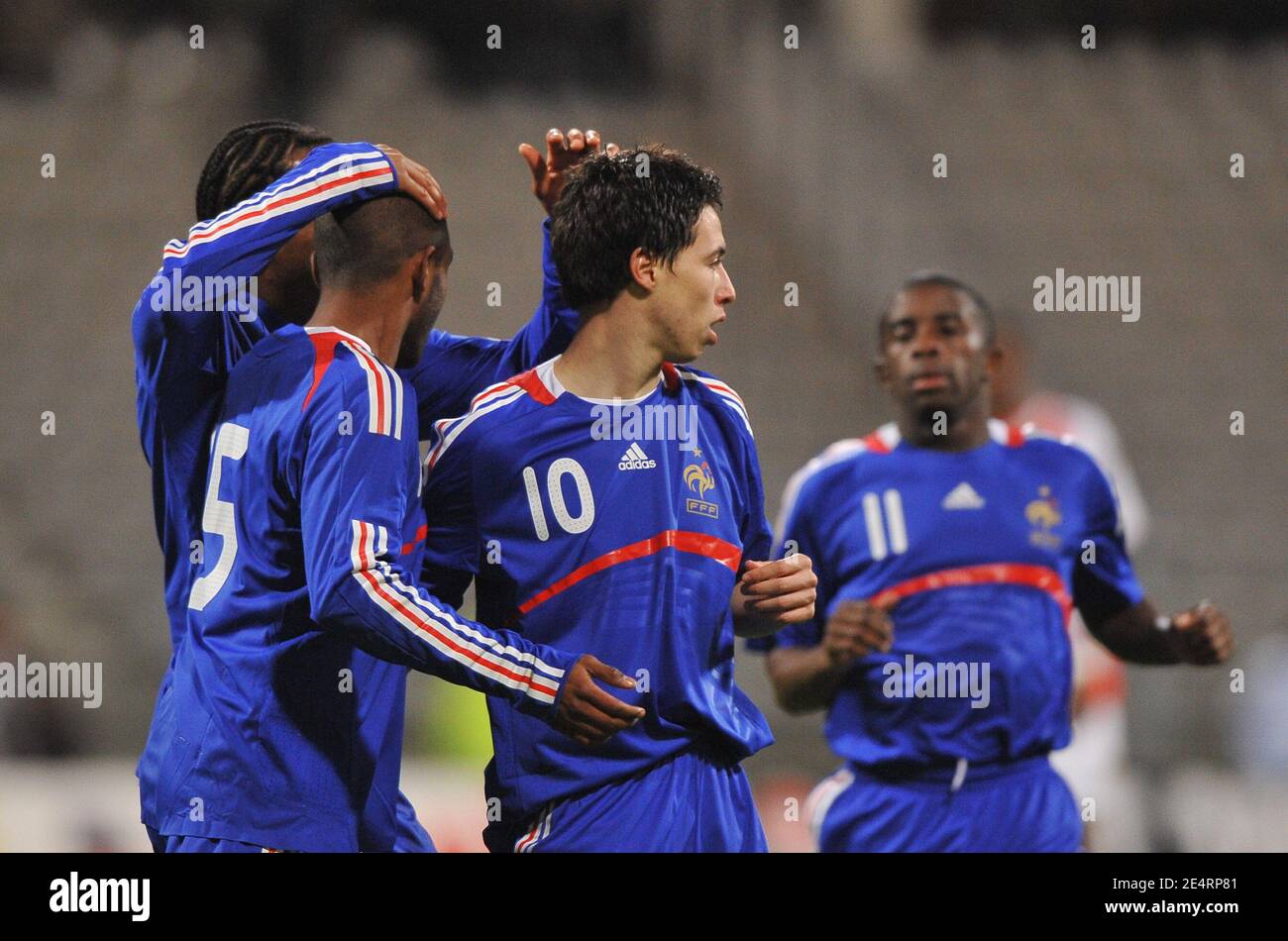 (L-R) France's Florent Sinama Pongolle, Jimmy Briand, Samir Nasri and Rio Antonio Mavuba celebrate the first goal during the friendly soccer match, France A' vs Mali at the Charlety stadium in Paris, France on March 25, 2008. France defeats Mali 3-2. Photo by Steeve McMay/Cameleon/ABACAPRESS.COM Stock Photo