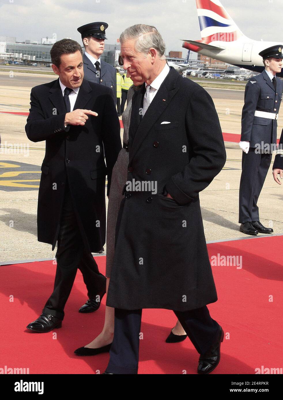French President Nicolas Sarkozy and Carla Bruni-Sarkozy welcomed by HRH Prince Charles of Wales at Heathrow airport in London , UK for state visit in England, on March 26, 2008. Photo by Olivier Sanchez Rocca/Pool/ABACAPRESS.COM Stock Photo