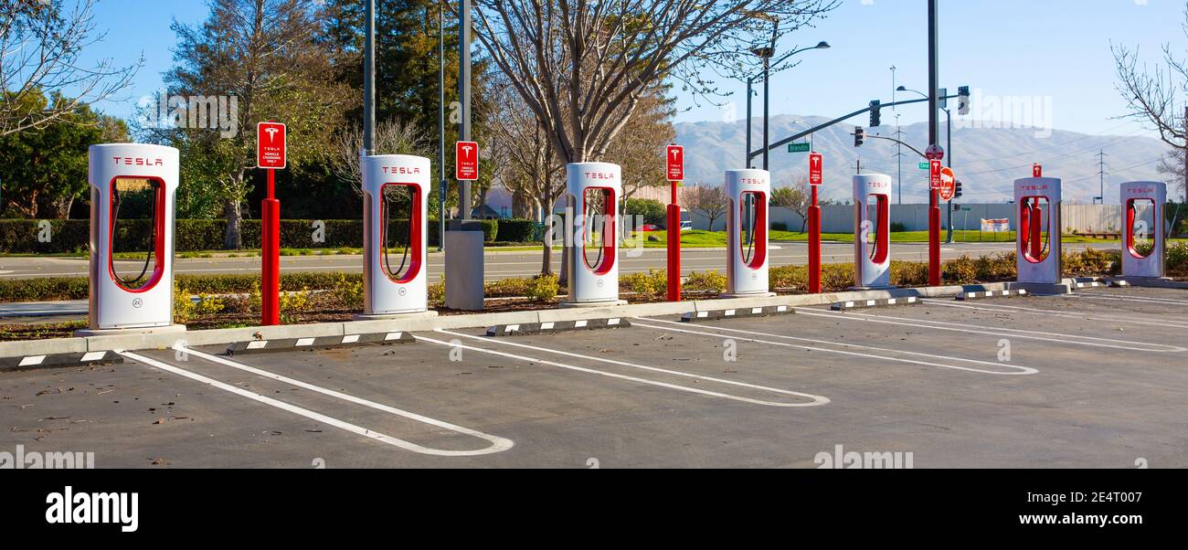 Fremont, CA, USA - January 20, 2021: Tesla Supercharger for electric cars. Tesla is  an American electric vehicle and clean energy company Stock Photo