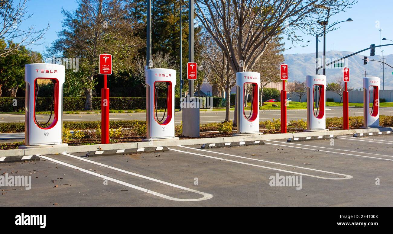 Fremont, CA, USA - January 20, 2021: Tesla Supercharger for electric cars. Tesla is  an American electric vehicle and clean energy company Stock Photo