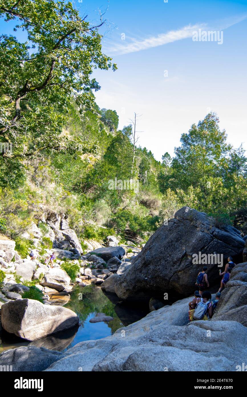 Adventure People treeking in Parque Nacional Peneda Gerês in North Portugal Beautiful camping landscapes and wild walks. Hiking in Portugal Stock Photo