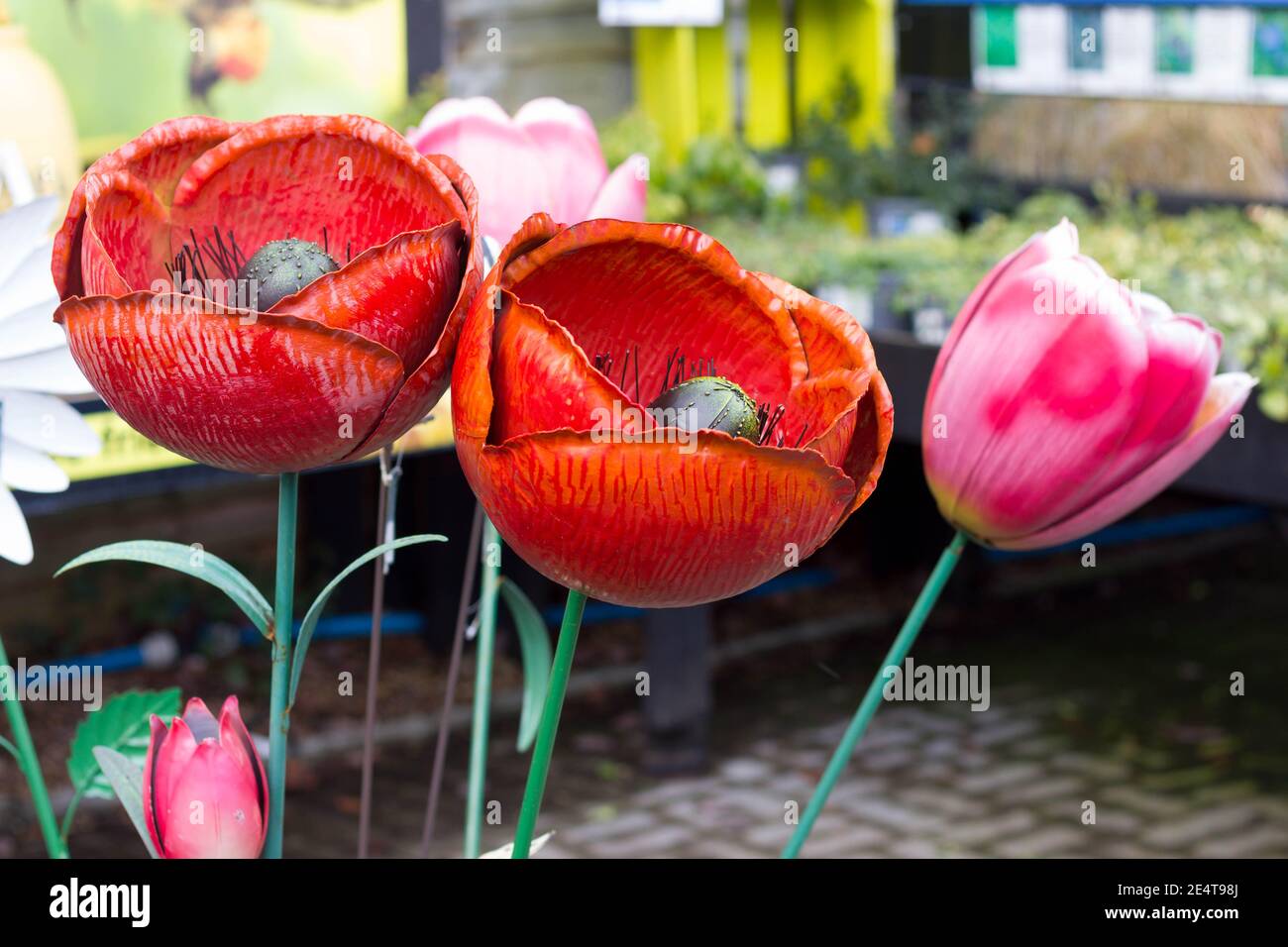 Artificial flowers in display in garden centre Stock Photo Alamy