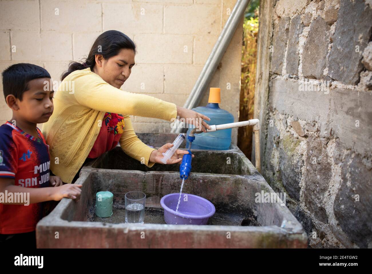 Home tapbased water filter system in use in San Juan la Laguna