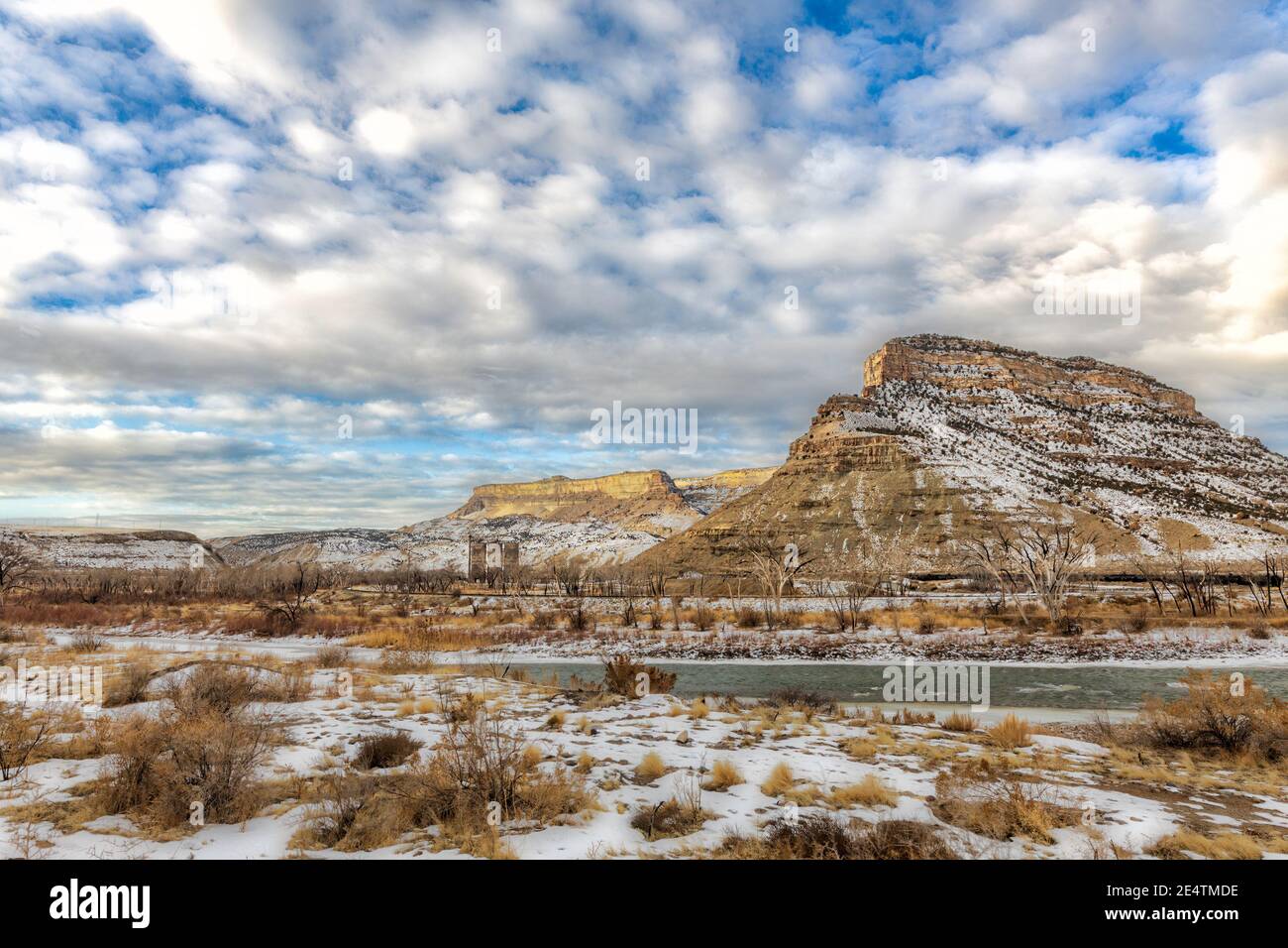 beautiful clouds roll over the desert buttes at Colorado State Park, James M. Robb Island acres state park on a winter day with the Colorado River run Stock Photo