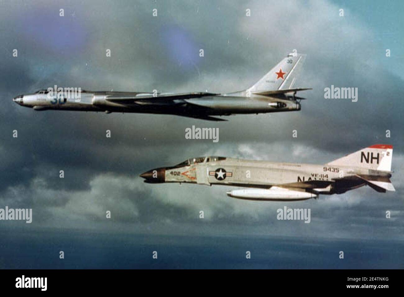 McDonnell F-4B VF-114 intercepting Tu-16 1963. Stock Photo