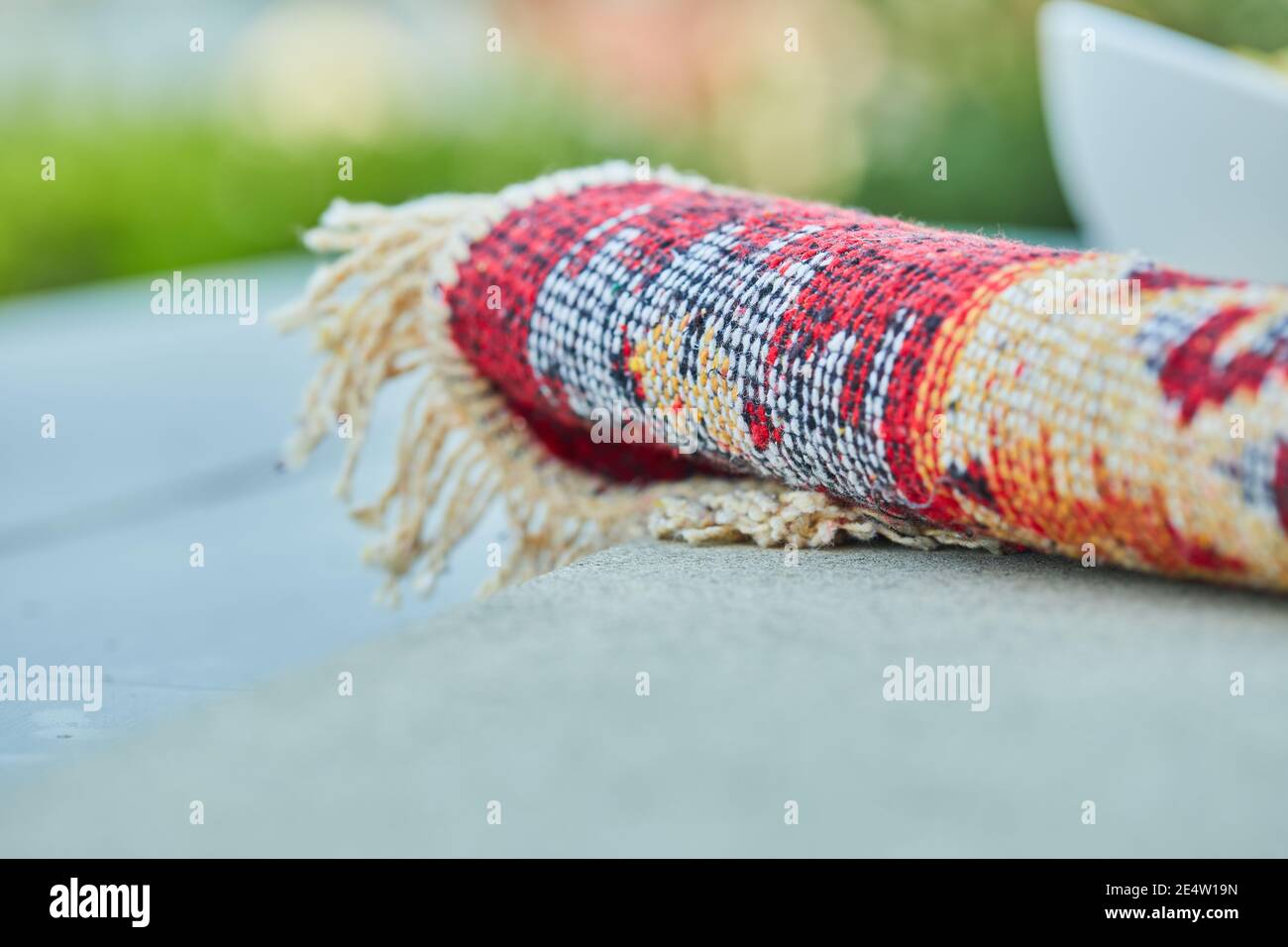 Small carved rug on white background Stock Photo