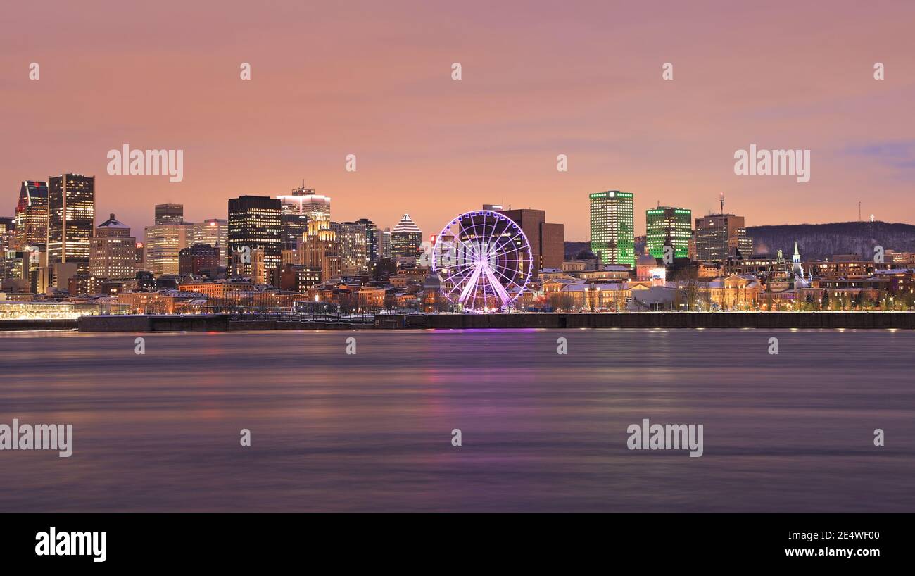 Montreal skyline and St Lawrence River at dusk in winter, Quebec, Canada Stock Photo