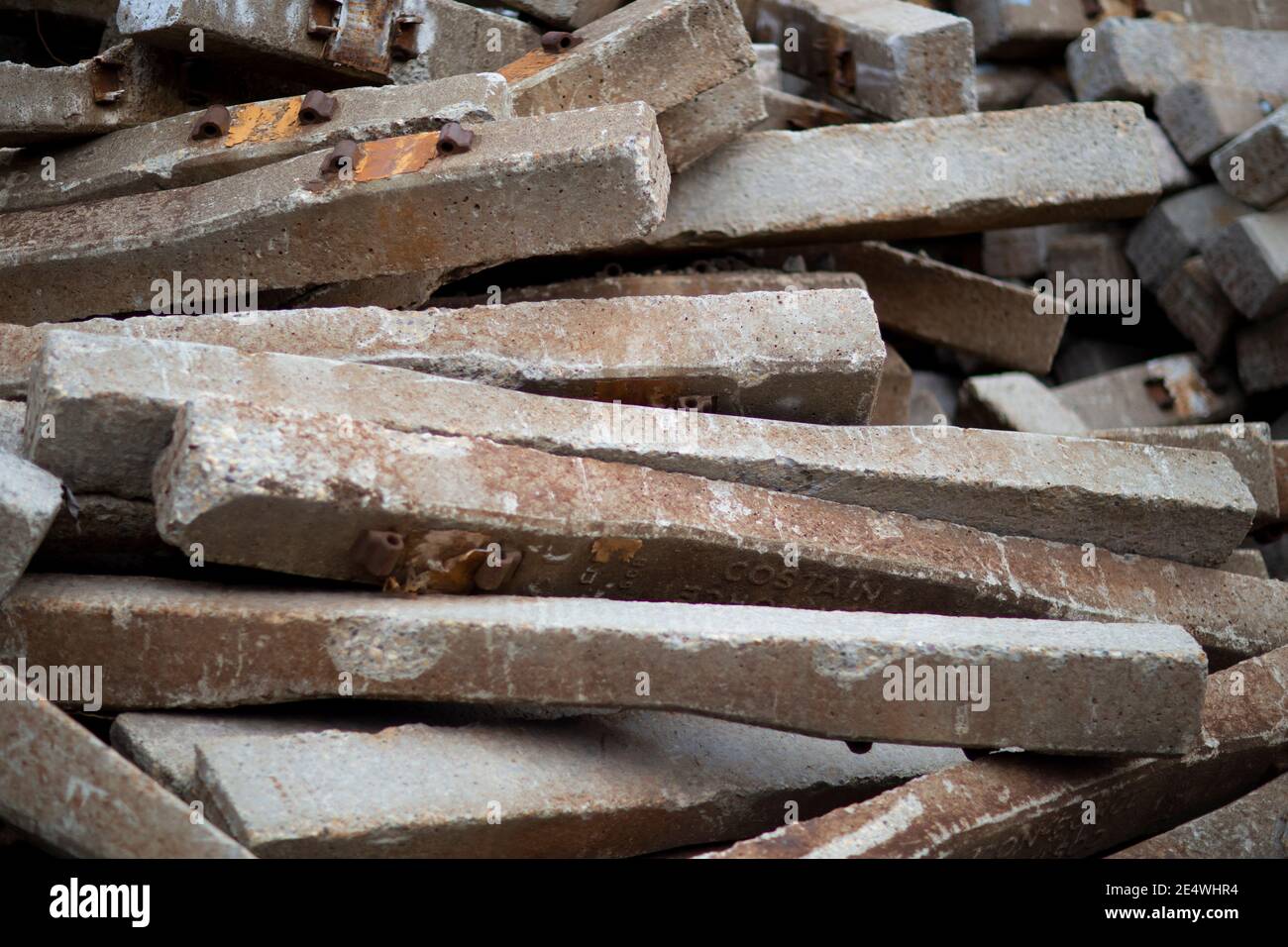 A stack of used concrete railroad ties, at the BNSF railroad yard, Troy