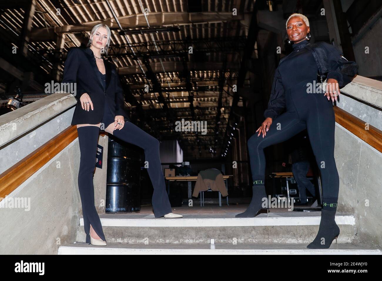 Berlin, Germany. 22nd Jan, 2021. Lena Gercke (l) and Nikeata Thompson stand  on a staircase before the show at the About You Fashion Week production at  Kraftwerk in Köpenicker Straße. The Berlin