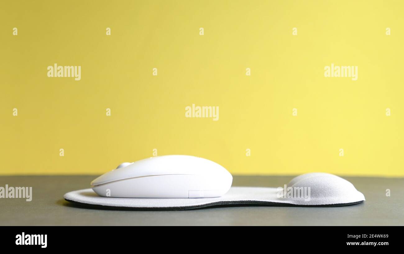 Wireless mouse and mouse pad with wrist rest. Isolated. Stock Photo