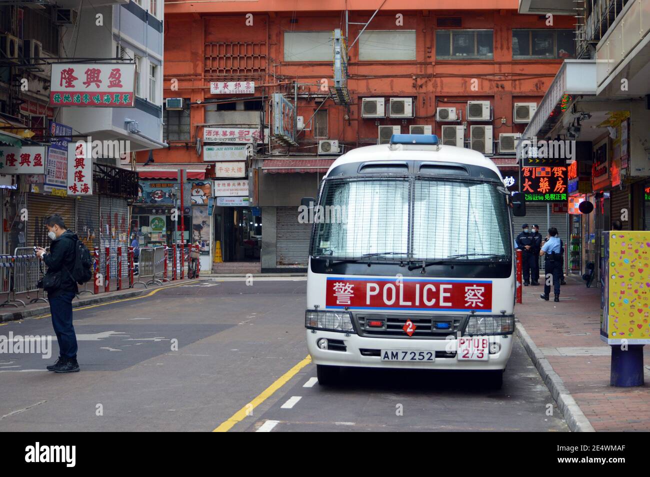 Hong Kong Police van pictured during Covid-19 coronavirus pandemic lockdown in Yau Ma Tei, Kowloon, Hong Kong in January 2021 Stock Photo