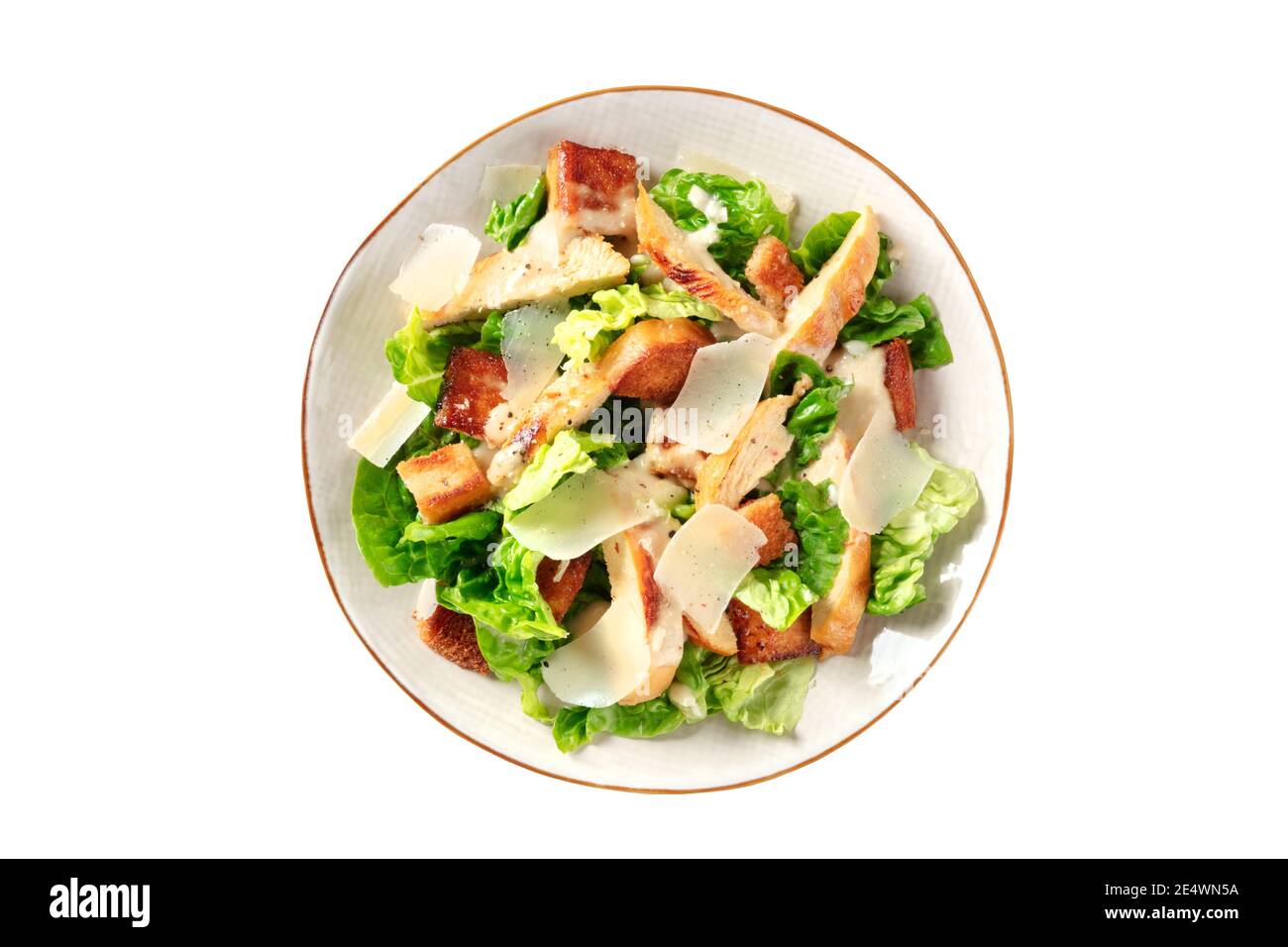 Caesar salad with grilled chicken, green lettuce and Parmesan, isolated