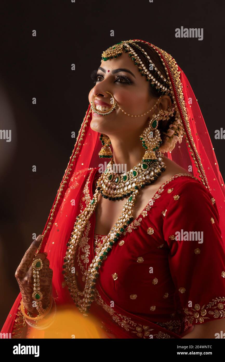 India earing portrait hi-res stock photography and images - Alamy