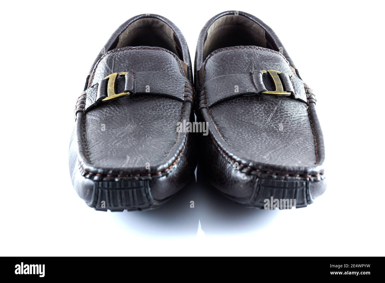 Brown leather shoes on white background Stock Photo - Alamy