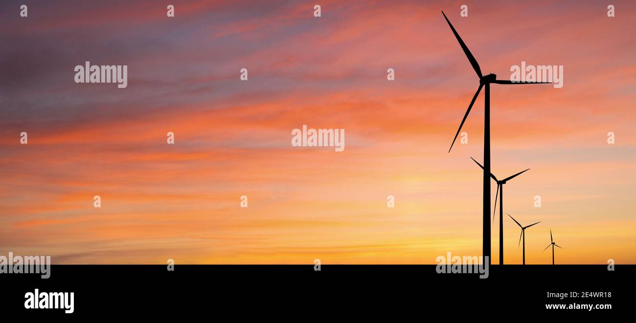 silhouettes of wind turbines at sunset Stock Photo - Alamy