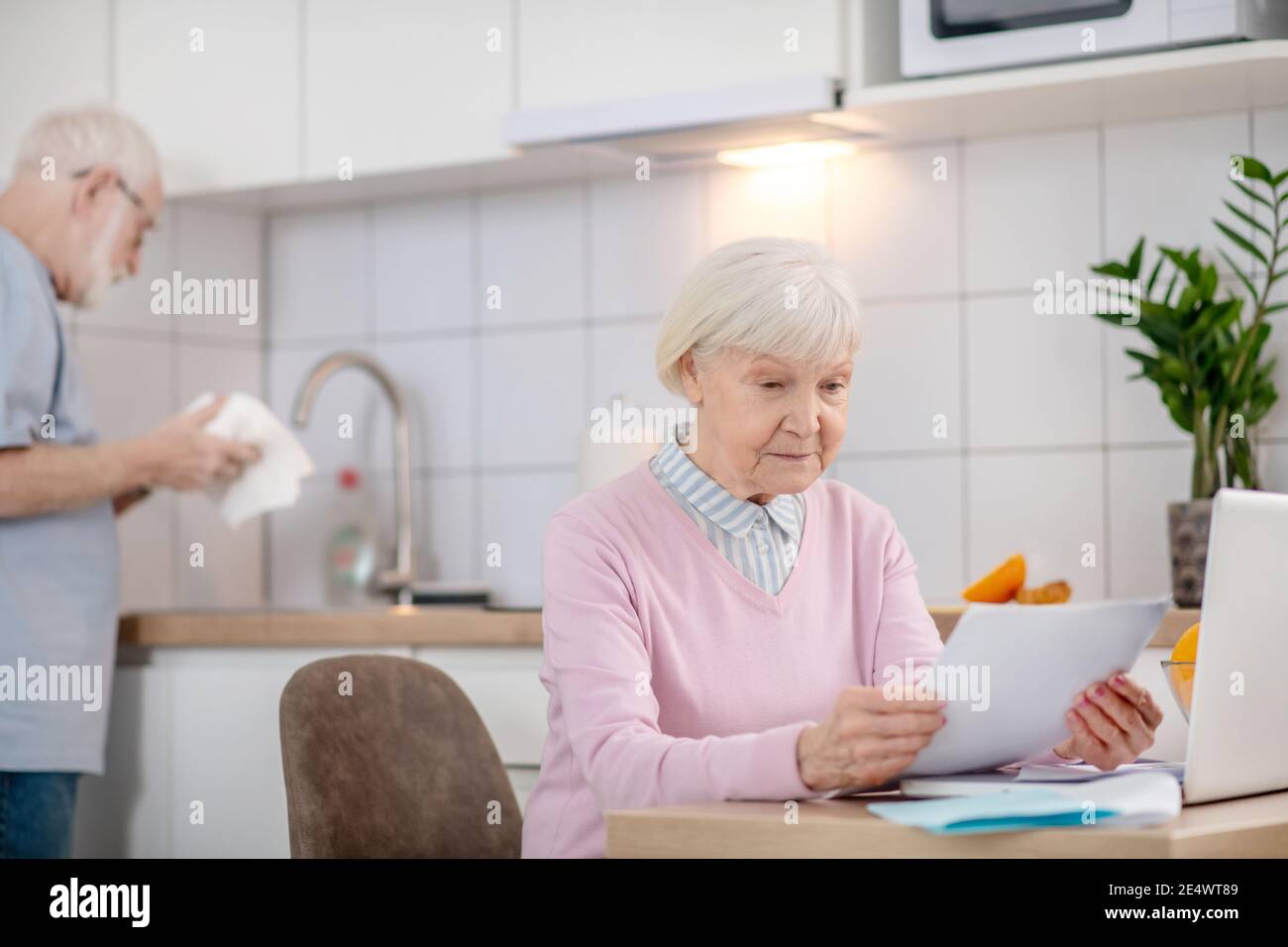 Serious grey haired woman hi-res stock photography and images - Alamy