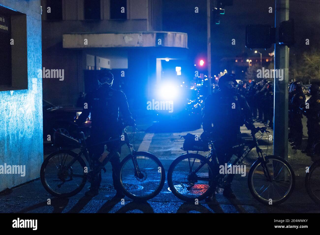 USA. 24th Jan, 2021. Late in the evening police forming a line