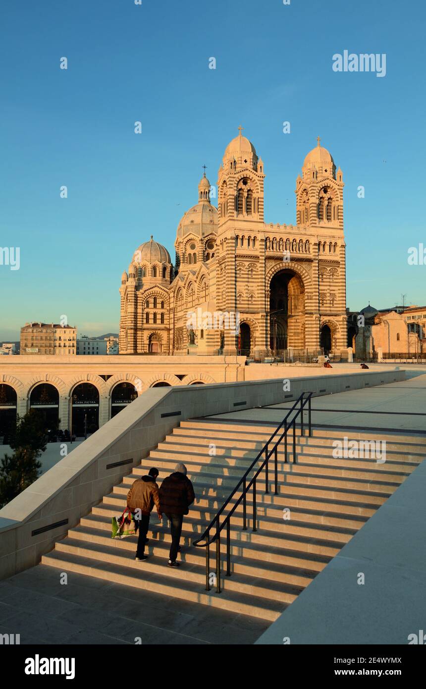 A Couple Climb the Steps to Marseille Cathedral of Saint Mary Major built in Byzantine-Roman Revival Style (1852-1896) Marseille France Stock Photo
