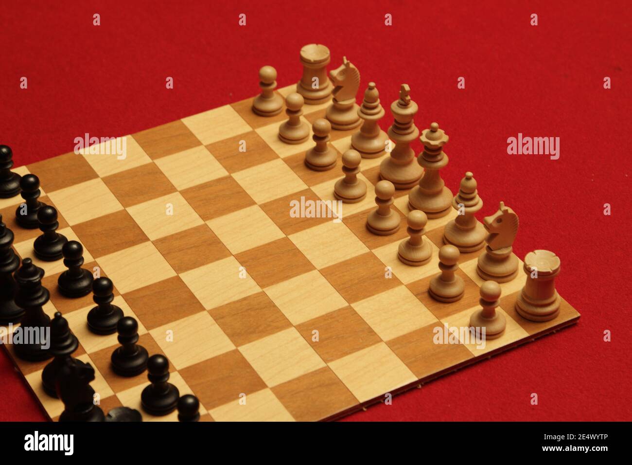 Chess pieces in starting position on a wooden oak Board Stock Photo - Alamy