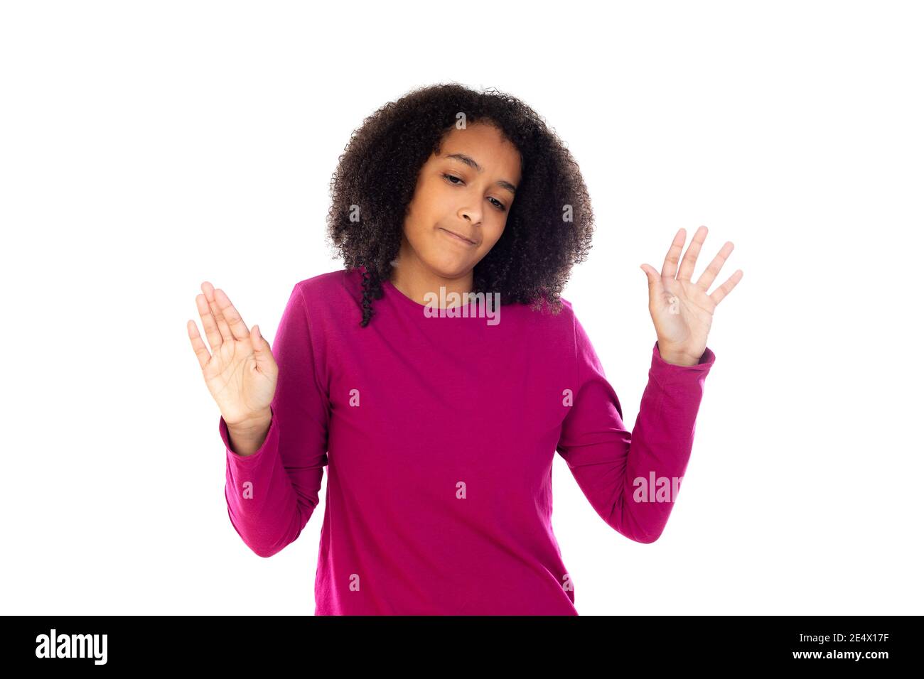 Beautiful teenager girl with pink sweater isolated on a white
