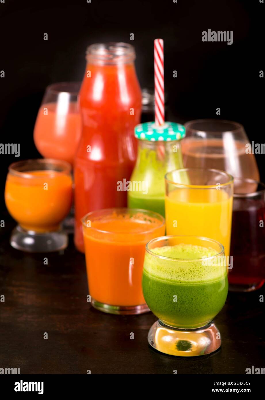 Various freshly squeezed fruits and vegetables juices Stock Photo Alamy