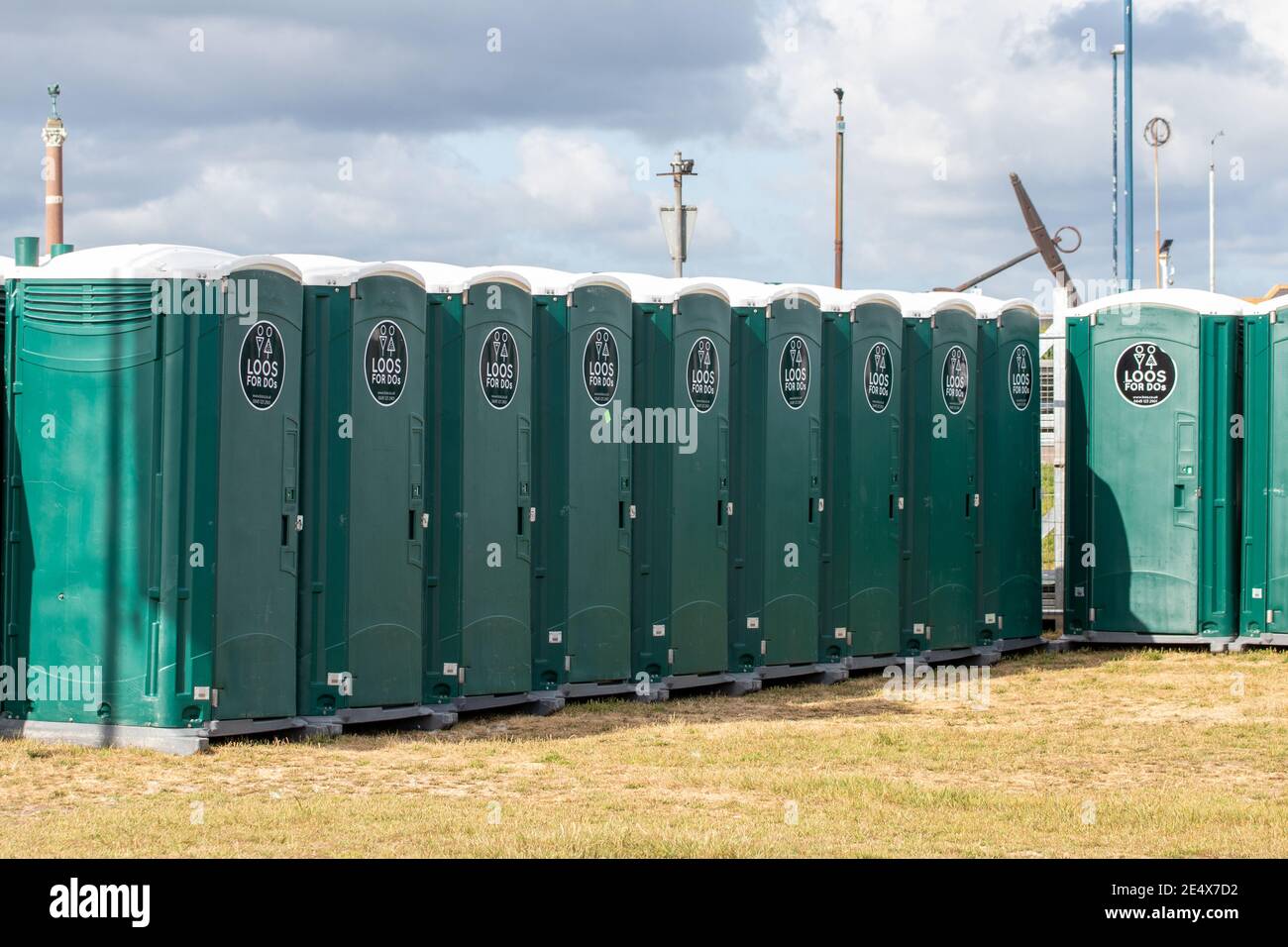 a row of portable toilets ready for a festival Stock Photo