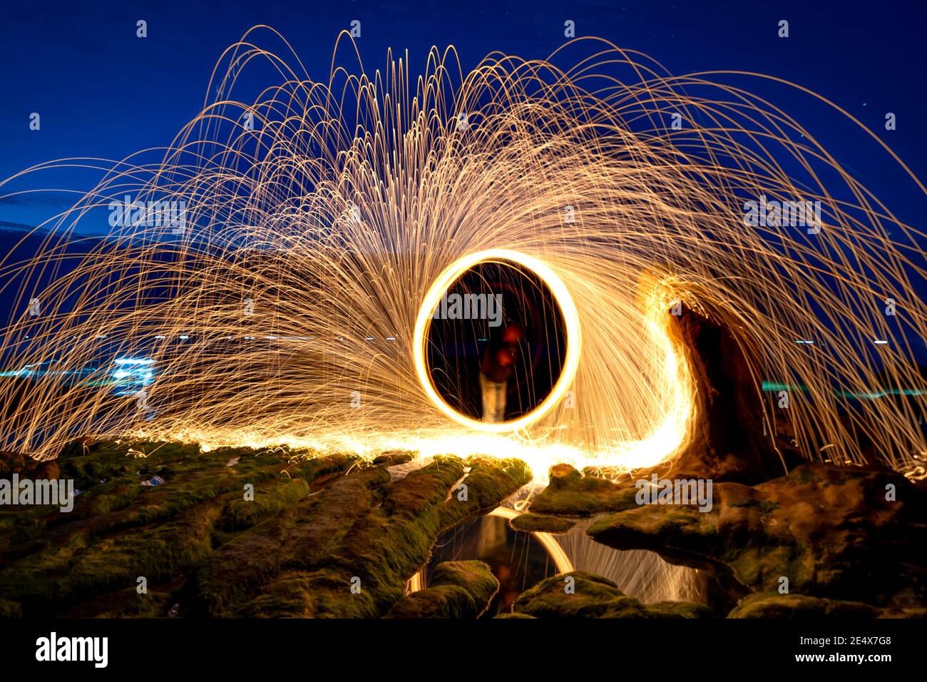 Amazing fire steel wool. Fire spinning circles with steel wool on the