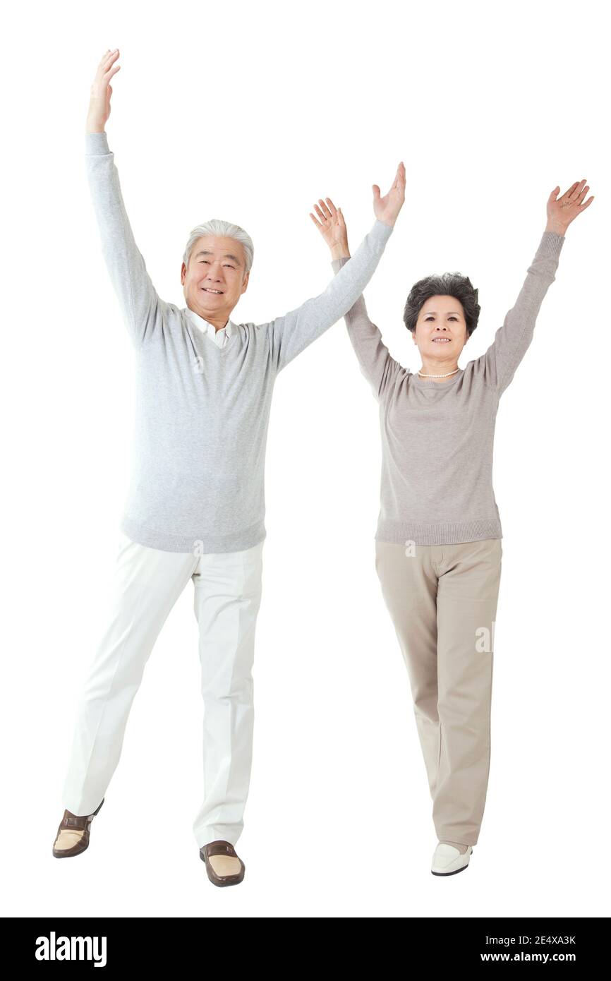Oriental old couple with arms upraised high quality photo Stock Photo