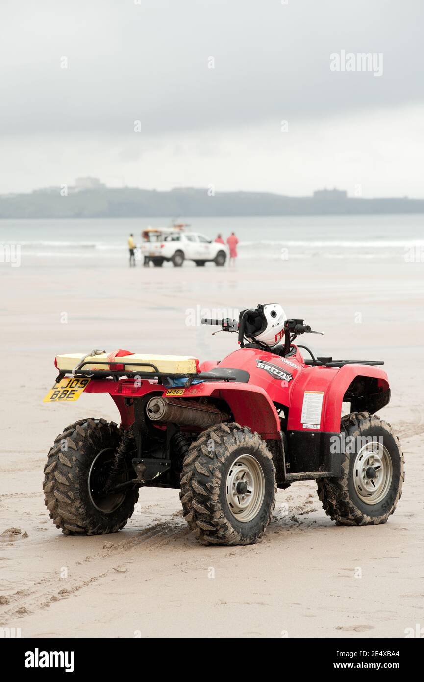 PENZANCE, CORNWALL, UK - JUNE 12, 2009: RNLI quad bike on beach with ...