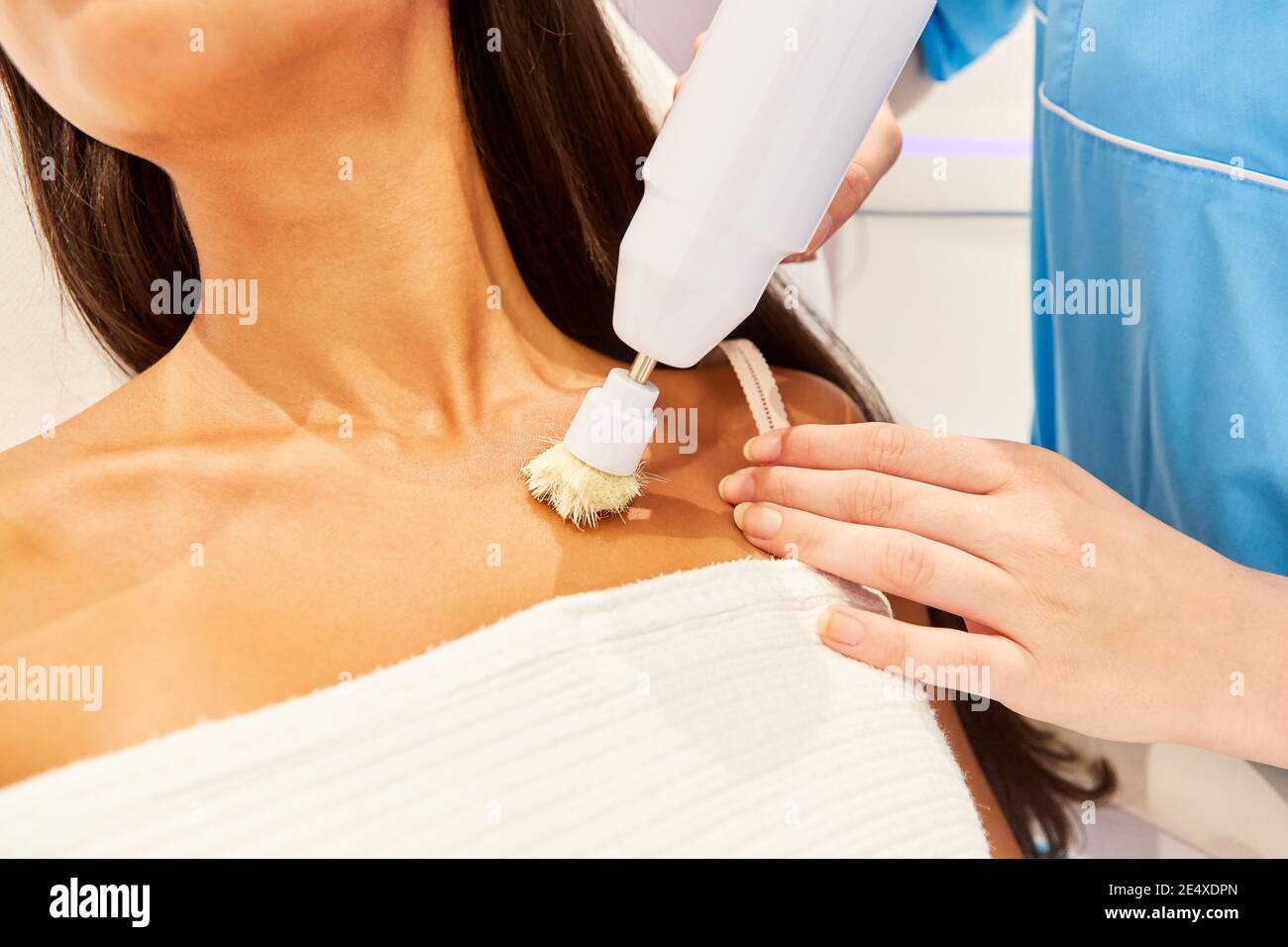 Woman with deep cleansing of the cleavage for better blood circulation and skin cleansing Stock Photo