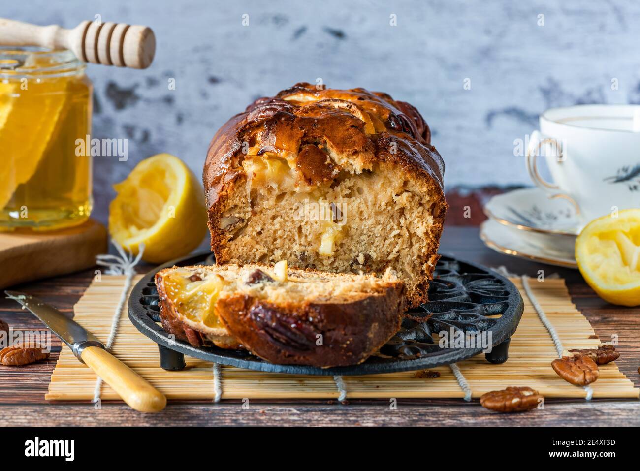 Honey, lemon and pecan nut loaf on a table Stock Photo