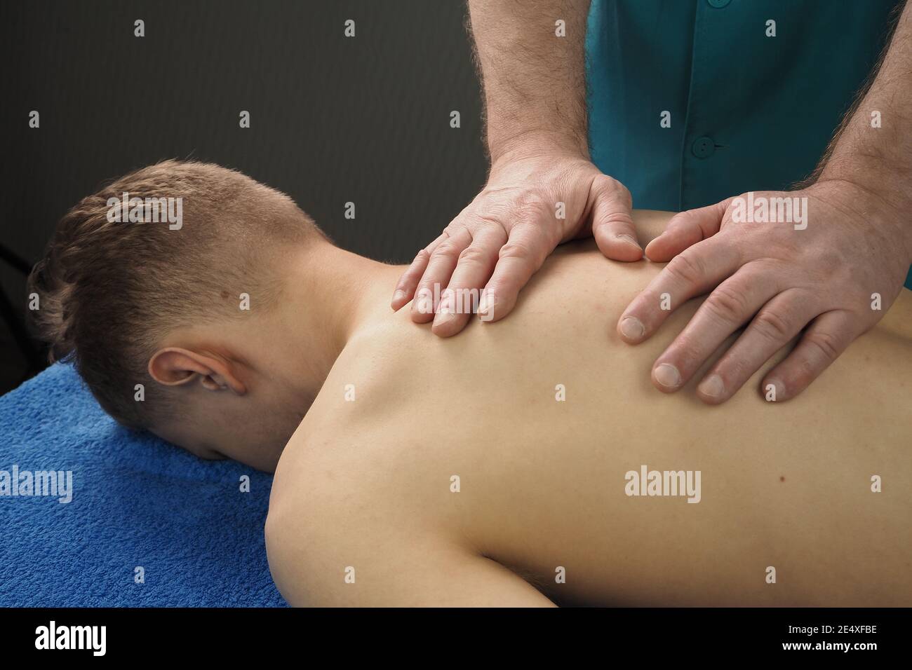 SPA and health. Manual back massage. A man on a massage couch