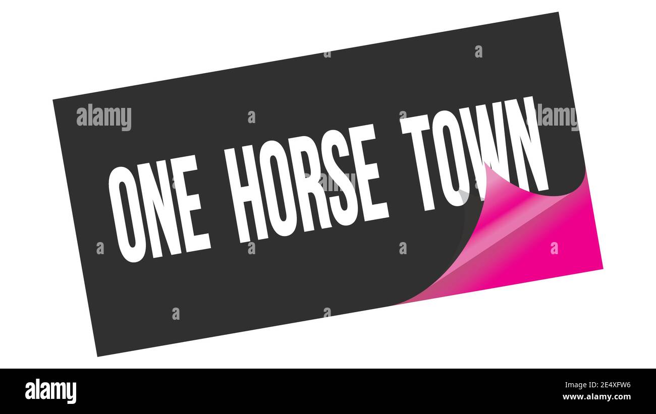 ONE  HORSE  TOWN text written on black pink sticker stamp. Stock Photo