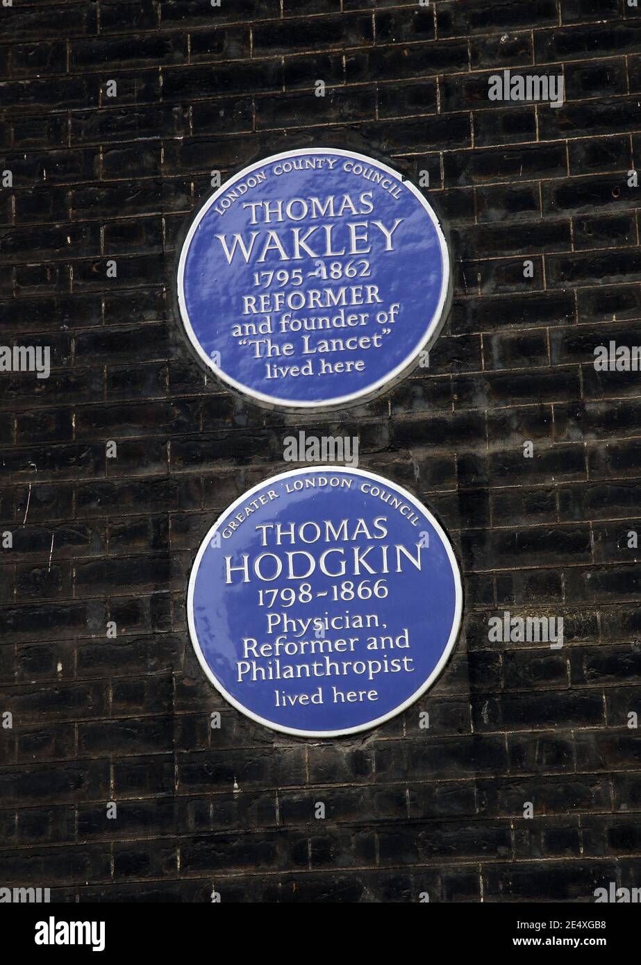 Blue Plaques commemorating Thomas Wakley and Thomas Hodgkin, Bedford Square, Bloomsbury, London, England Stock Photo