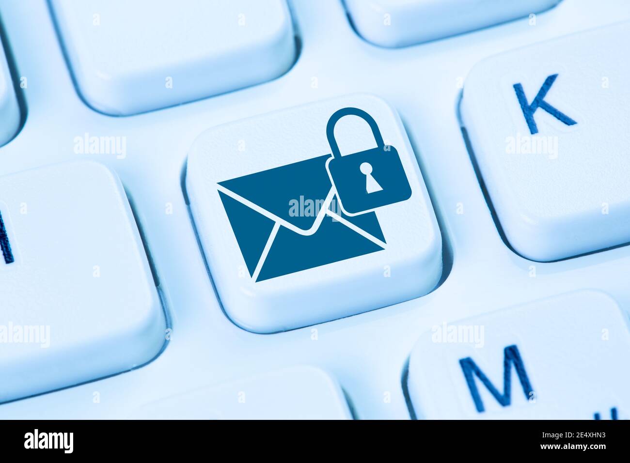 Encrypted E-Mail protection online hacker sending secure mail internet computer keyboard Stock Photo