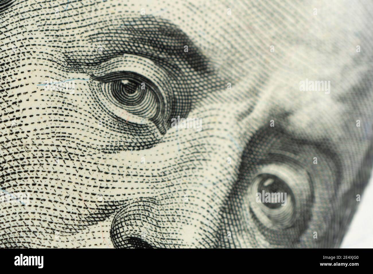 Extreme close-up of one hundred bill Franklin portrait. focus on eyes. Stock Photo