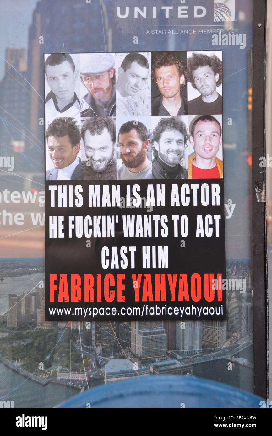 LOOKING FOR WORK. A sign in Midtown Manhattan with several photos of Fabrice Yahyaoui who is looking for work as an actor. Stock Photo