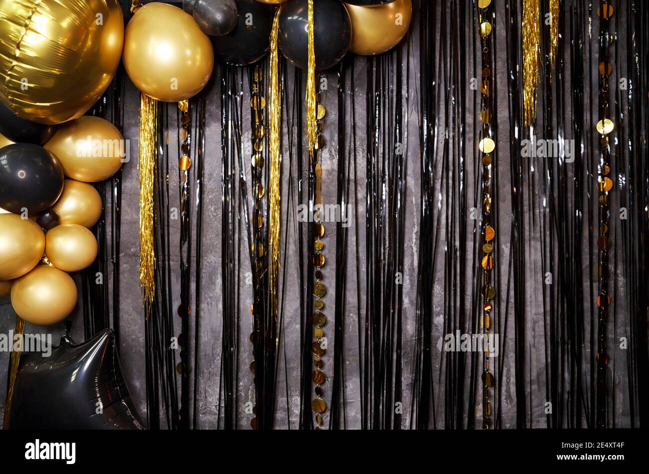 Happy birthday holiday. Party time. Shiny gold, black balloons Stock Photo  - Alamy