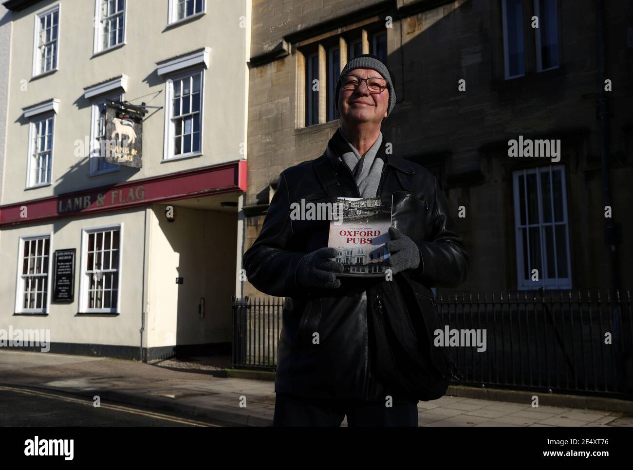 Spokesman for CAMRA (Campaign for Real Ale) Dave Richardson poses for a photograph outside The Lamb and Flag, the Grade-II listed pub being forced to close after more than 400 years of business, following outbreak of the coronavirus disease (COVID-19) pandemic, in central Oxford, Britain, January 25, 2021.  REUTERS/Eddie Keogh Stock Photo