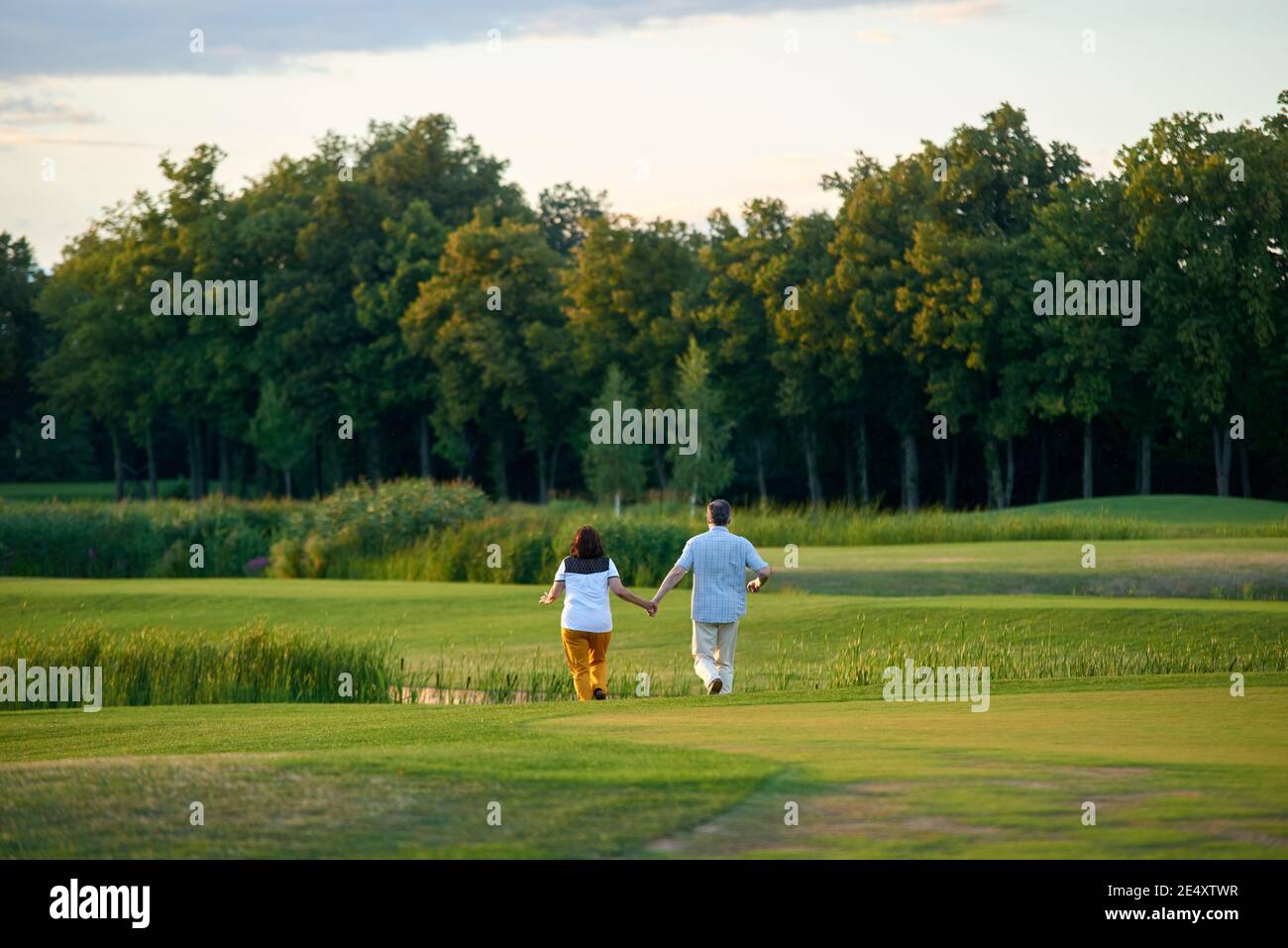 Happy family run forward on hi-res stock photography and images - Alamy