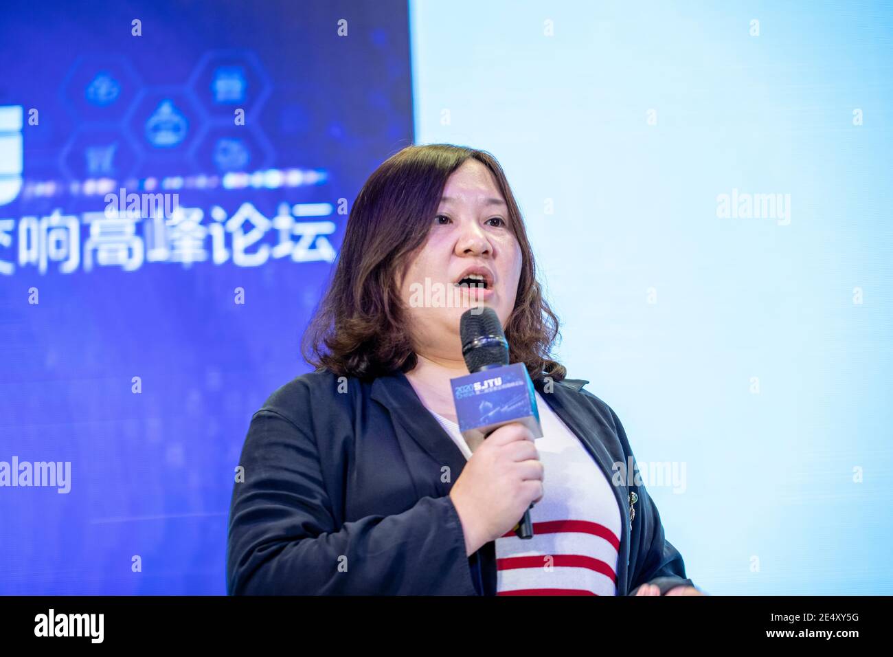 --FILE—Yu Le, co-founders of Dingdong Maicai, a fresh vegetable e-commerce platform, delivers a speech during a forum held at Shanghai Jiao Tong Unive Stock Photo