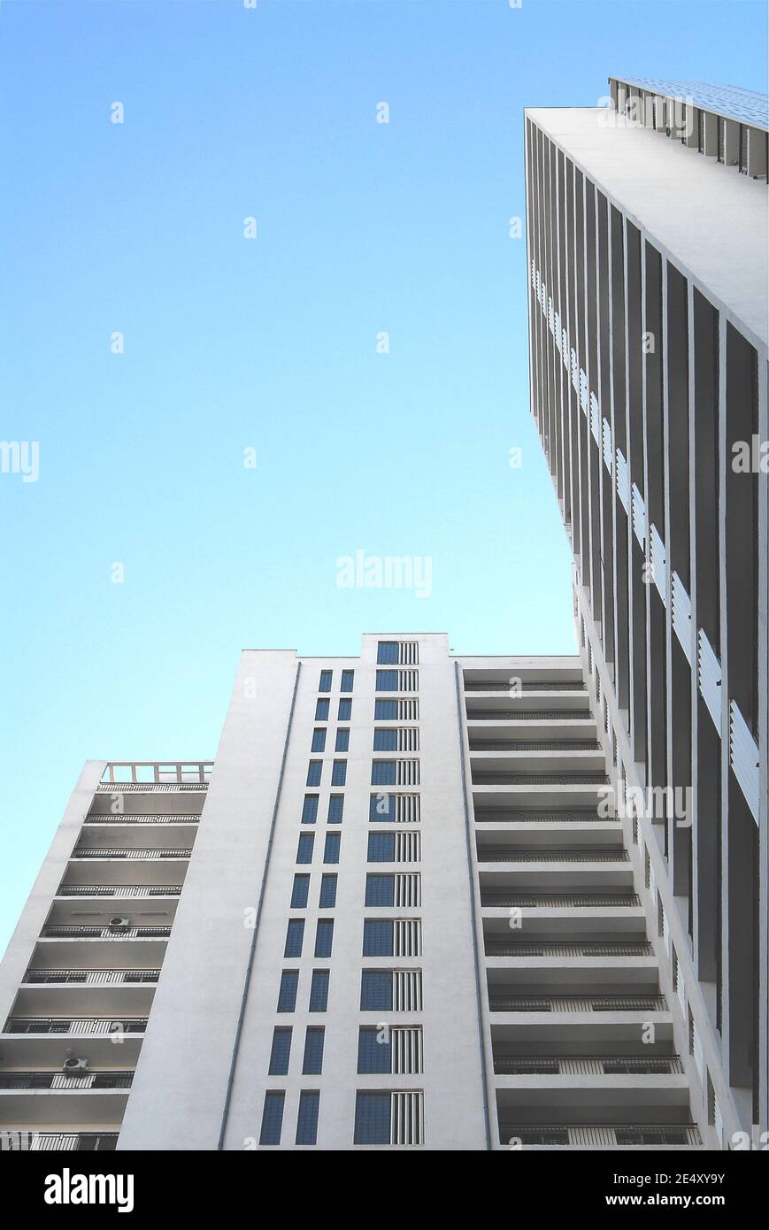 Modern multistory building view from the ground Stock Photo - Alamy