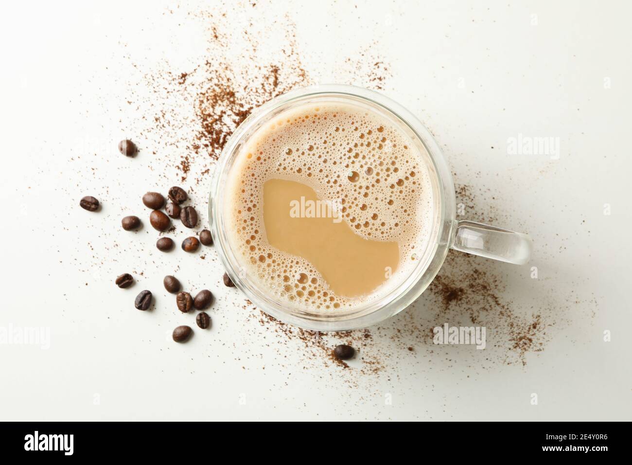 Cup of coffee and coffee beans on white background Stock Photo - Alamy