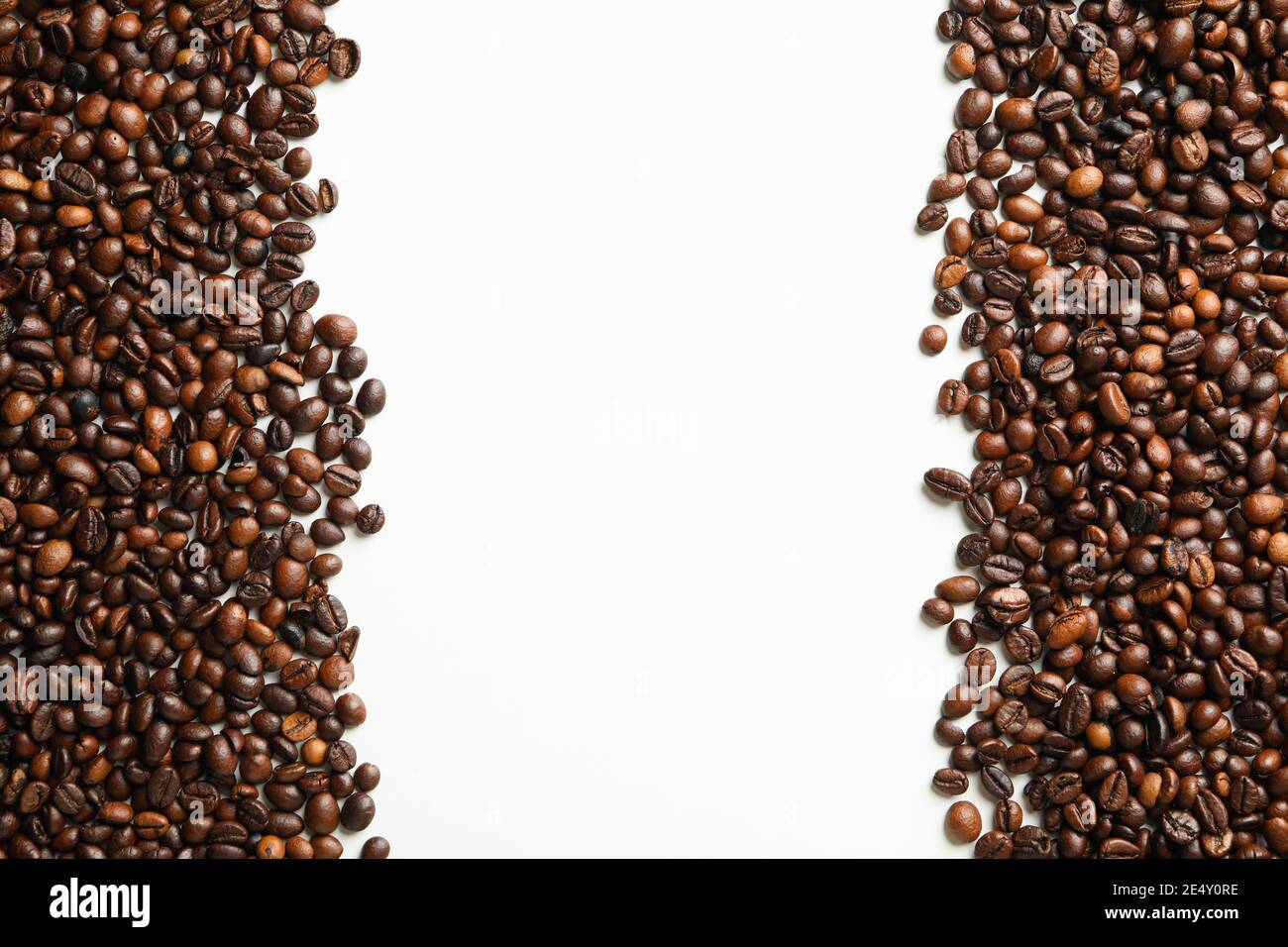 Roasted coffee beans on white background, space for text Stock Photo ...