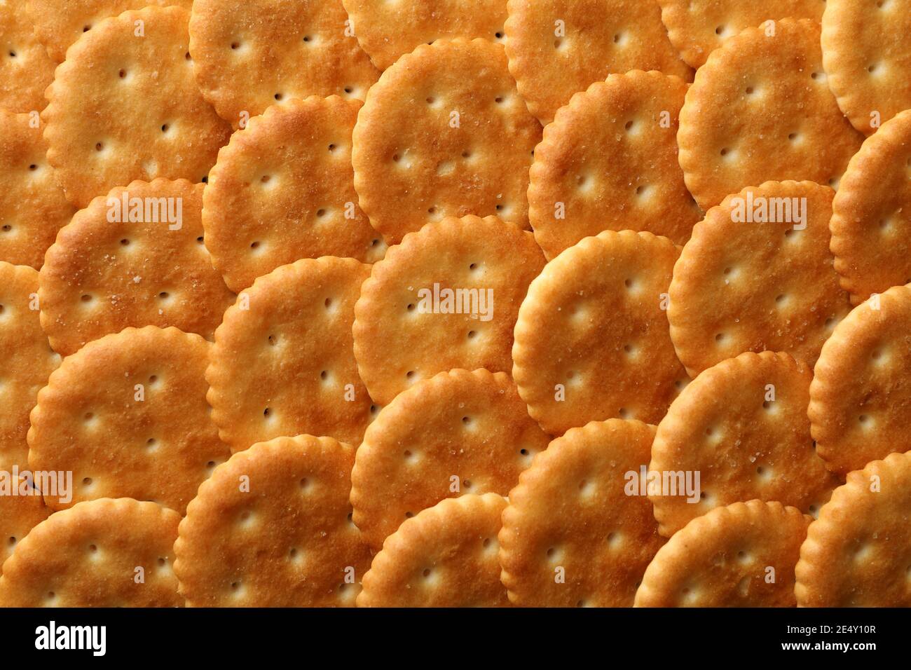 Tasty cracker biscuits on whole background, close up Stock Photo Alamy