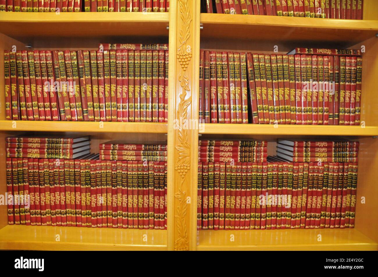 Jewish bookcase Jewish Prayer books (Sidur) and religious works on a shelf in a bookcase Stock Photo