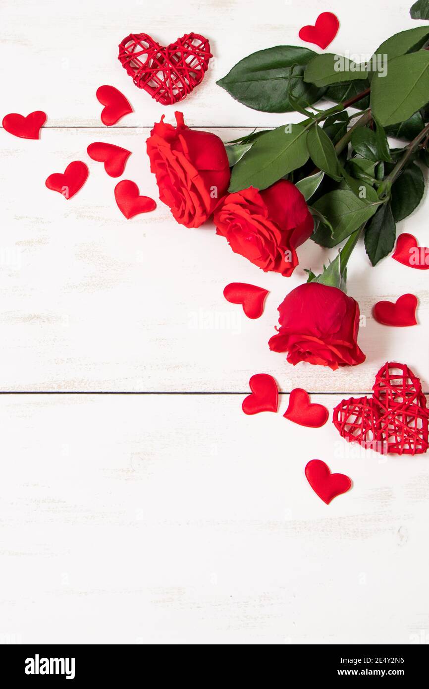 Valentine's day greeting card. Red roses and hearts on white background ...