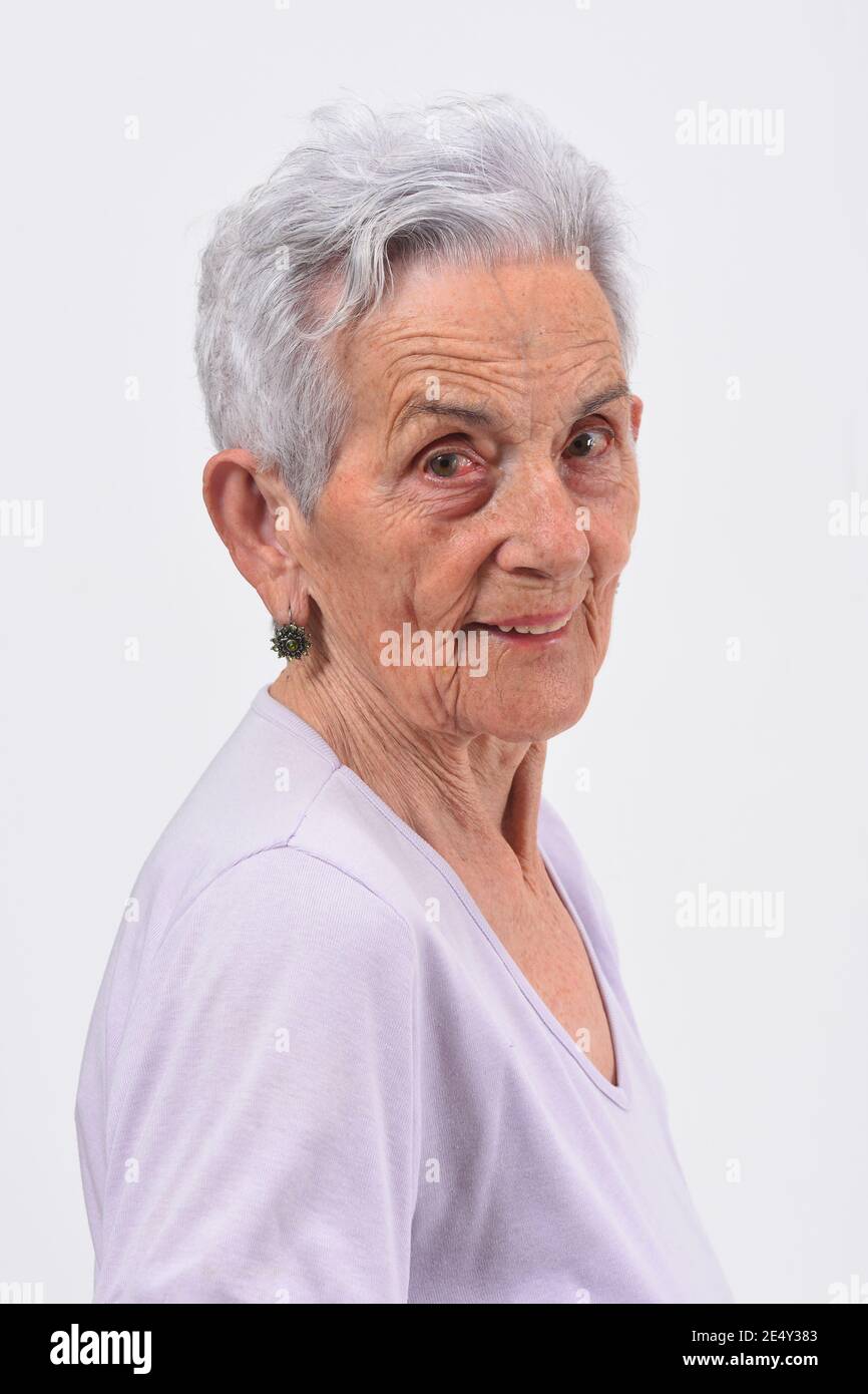 portrait of a senior woman on white background Stock Photo - Alamy