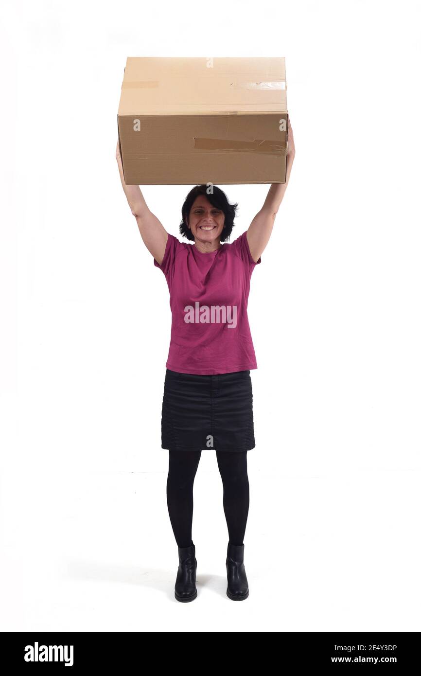 happy woman lifting a package on white background Stock Photo