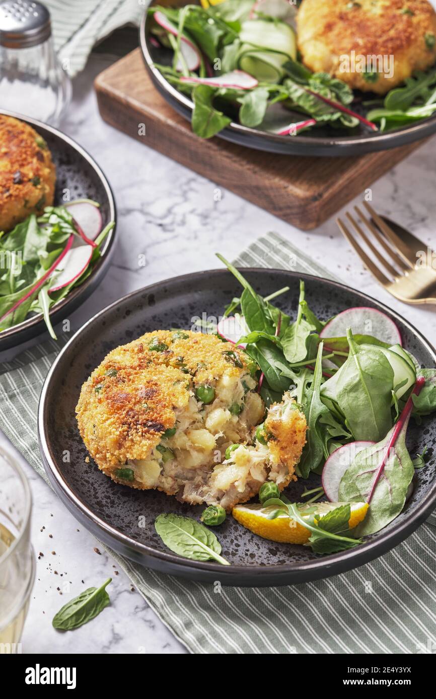 Smoked mackerel fishcakes served with a rocket, spinach salad Stock